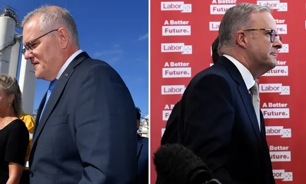 Australský premiér Scott Morrison (vlevo) a vůdce opozice Anthony Albanese na stopě australské volební kampaně.