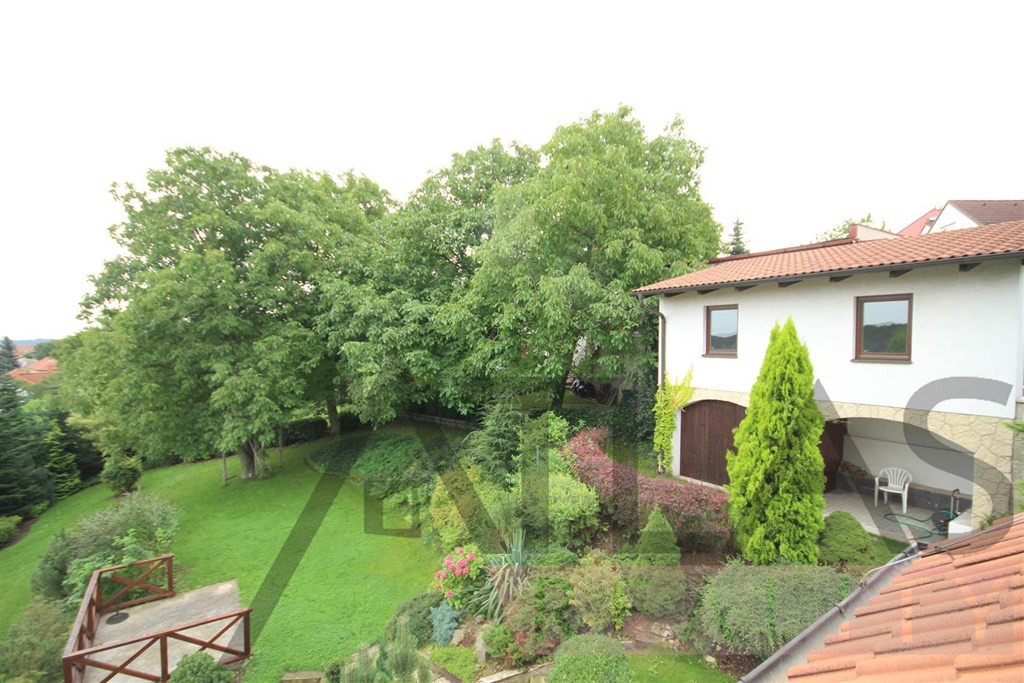 View of house and beautiful garden - For Rent: Unfurnished Four-bedroom family home, Prague 6 - Nebušice, close to the ISP Nebusice