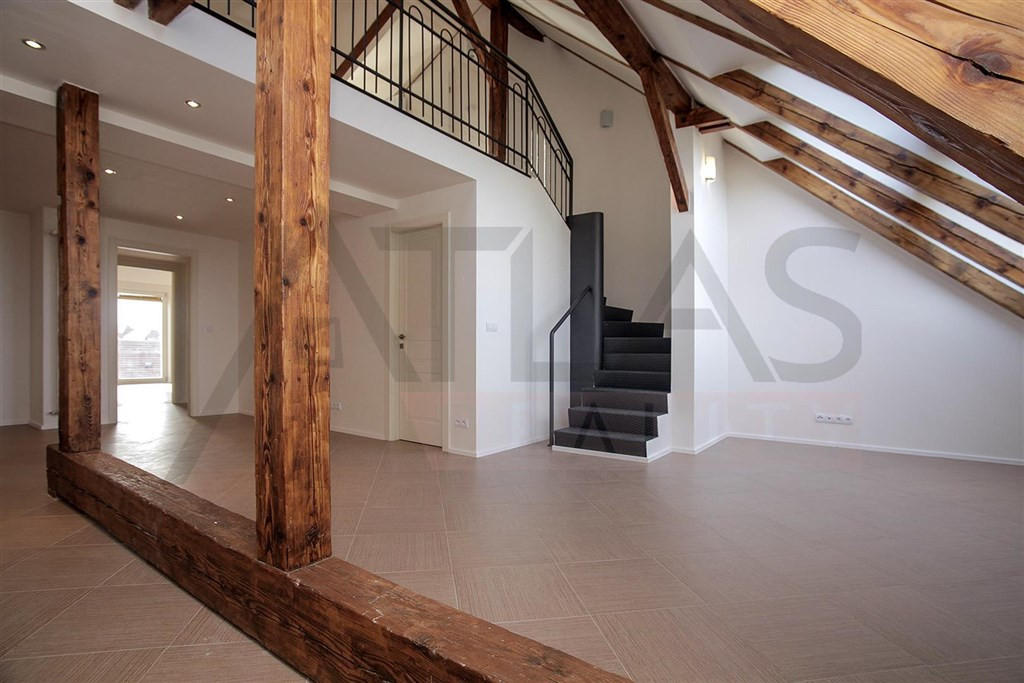 Living area and staircase - For Rent: Unfurnished 3-bedroom Duplex Apartment, 138,07sqm, Za Strahovem, Praha 6 - Břevnov